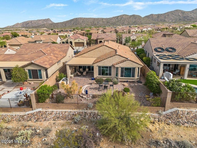 aerial view with a mountain view and a residential view