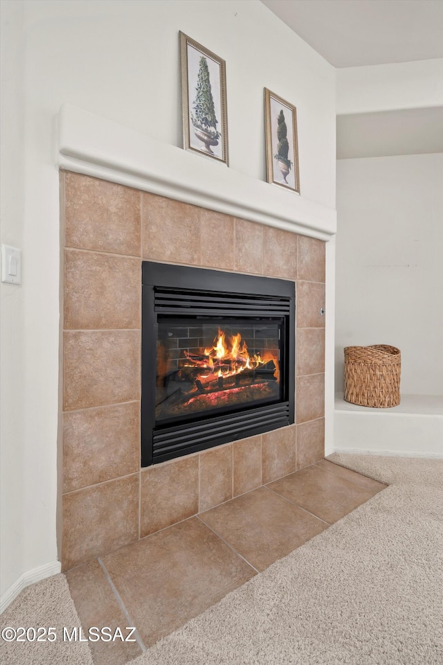 interior details with carpet flooring and a fireplace