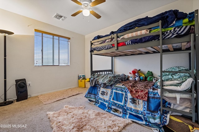 bedroom with visible vents, baseboards, a ceiling fan, and carpet