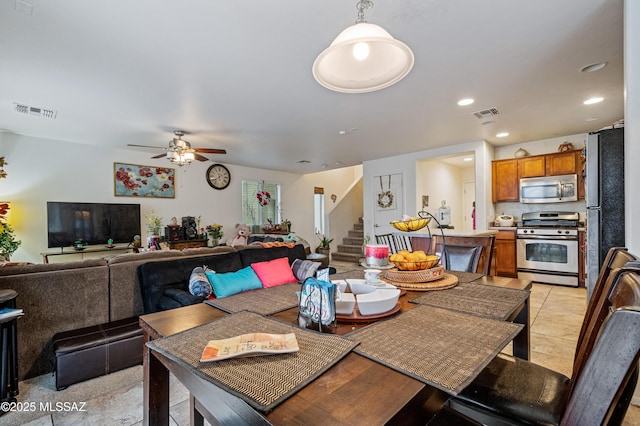 dining room with recessed lighting, stairs, visible vents, and a ceiling fan