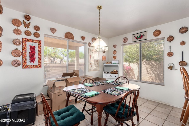 dining space with light tile patterned flooring