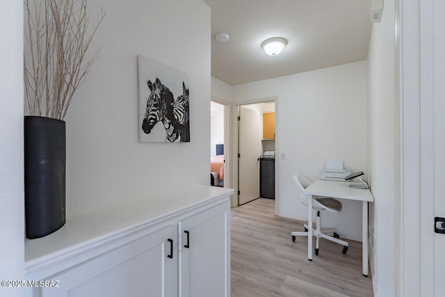 36526 S Wind Crest Dr, Tucson, AZ 85739 - home office with washer / clothes dryer and light wood-type flooring