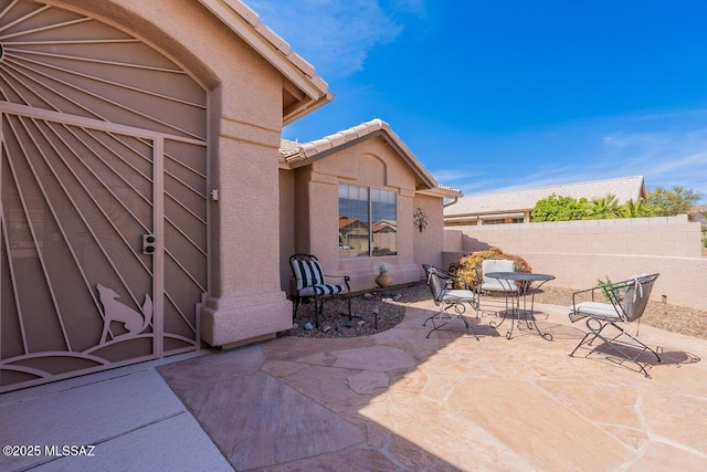 36526 S Wind Crest Dr, Tucson, AZ 85739 - view of patio / terrace featuring fence