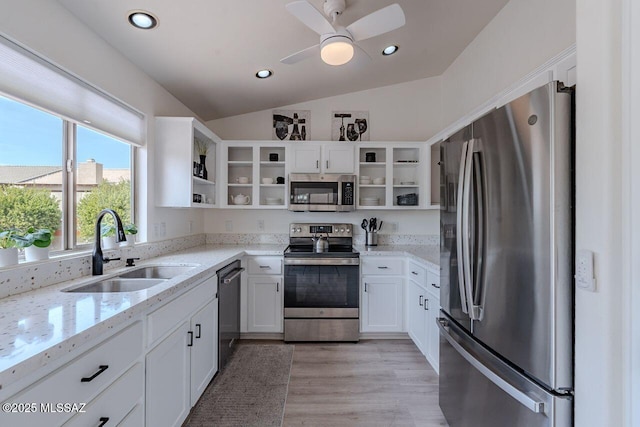 36526 S Wind Crest Dr, Tucson, AZ 85739 - kitchen with white cabinets, a sink, stainless steel appliances, and open shelves
