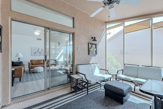 36526 S Wind Crest Dr, Tucson, AZ 85739 - sunroom featuring outdoor lounge area, a wealth of natural light, and ceiling fan