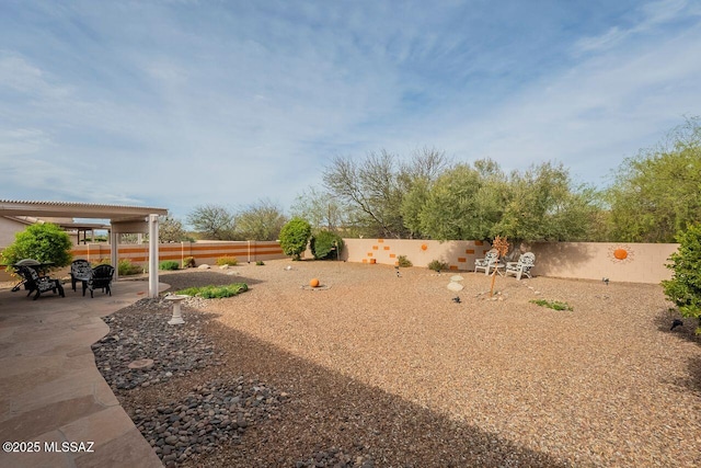 36526 S Wind Crest Dr, Tucson, AZ 85739 - view of yard with a fenced backyard, a patio, and a pergola