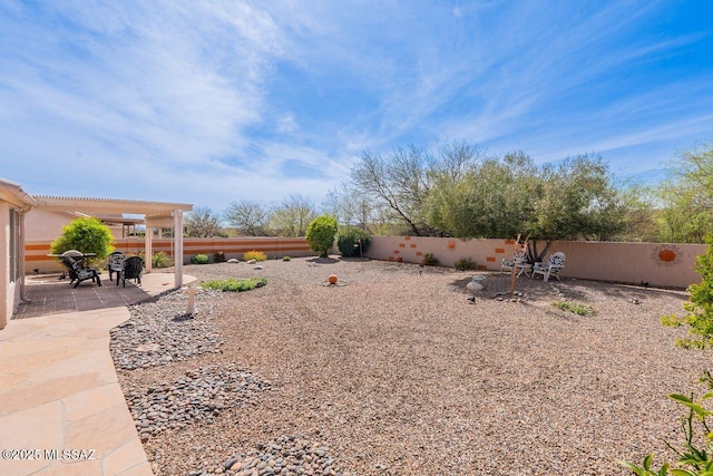 36526 S Wind Crest Dr, Tucson, AZ 85739 - view of yard featuring a pergola, a fenced backyard, and a patio area