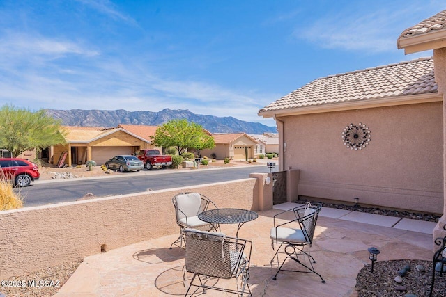 36526 S Wind Crest Dr, Tucson, AZ 85739 - view of patio / terrace featuring a residential view and a mountain view