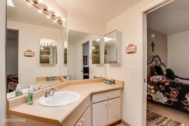 bathroom featuring connected bathroom and vanity