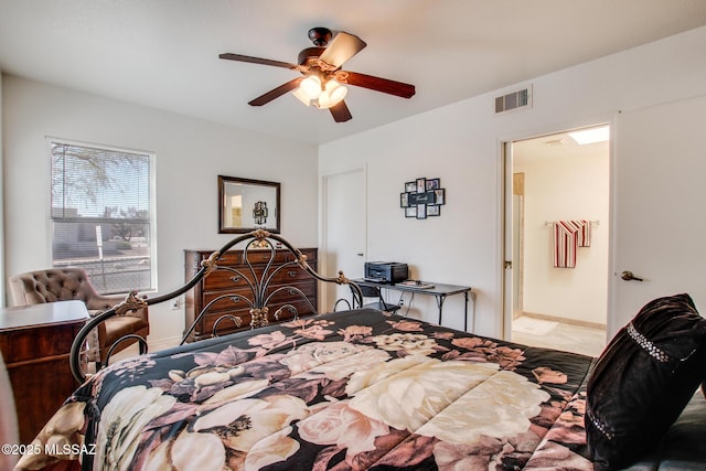 bedroom featuring visible vents and ceiling fan