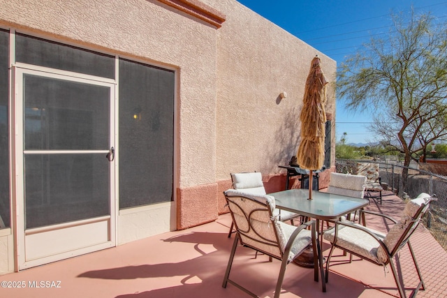 view of patio with outdoor dining area