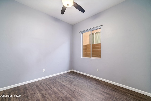 unfurnished room with ceiling fan, baseboards, and dark wood-style floors