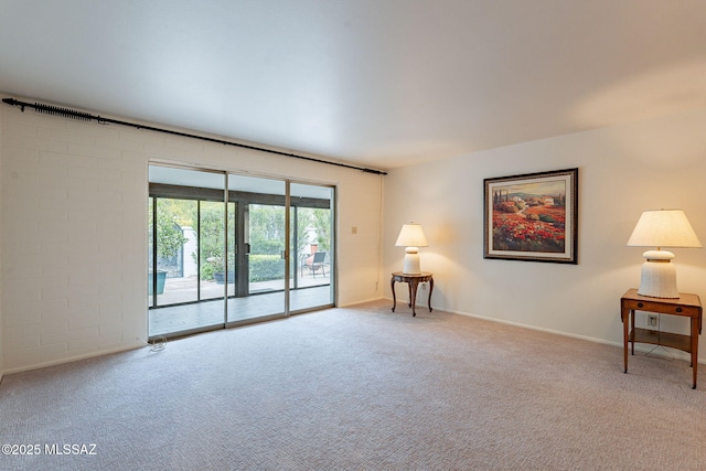 empty room featuring carpet floors