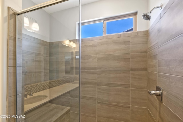 full bathroom featuring a tile shower