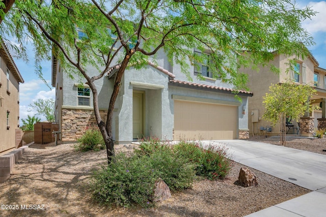 14239 E Axle Dr, Vail, AZ 85641 - mediterranean / spanish-style home featuring stone siding, stucco siding, a garage, concrete driveway, and a tile roof