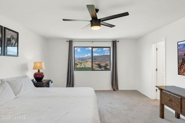 14239 E Axle Dr, Vail, AZ 85641 - bedroom featuring light carpet, baseboards, and a ceiling fan