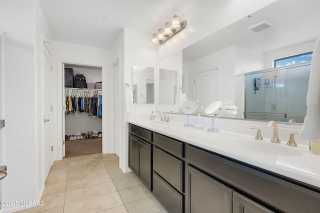 14239 E Axle Dr, Vail, AZ 85641 - full bath featuring a stall shower, double vanity, and a spacious closet