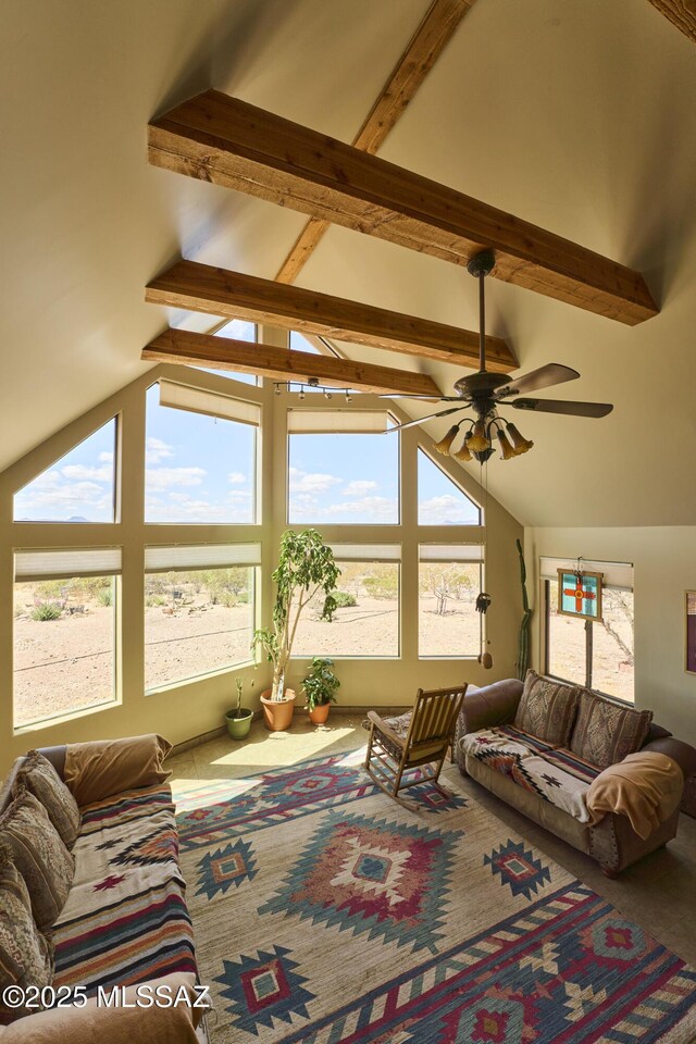living room featuring lofted ceiling with beams and ceiling fan