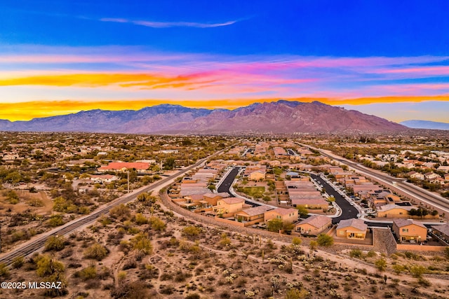 3576 W Granite Vista Dr, Tucson, AZ 85742 - aerial view at dusk of a residential view and a mountain view