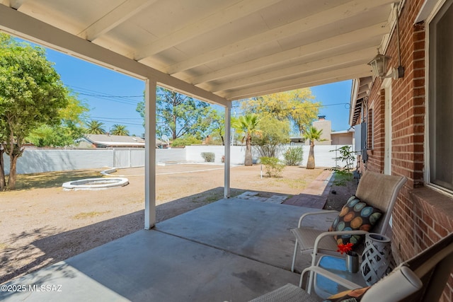 6517 E Cooper St, Tucson, AZ 85710 - fenced backyard with a patio