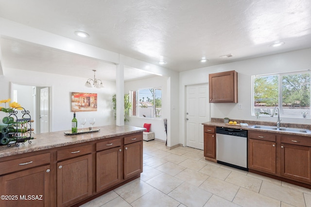 6517 E Cooper St, Tucson, AZ 85710 - kitchen featuring stainless steel dishwasher, a sink, healthy amount of natural light, a chandelier, and recessed lighting