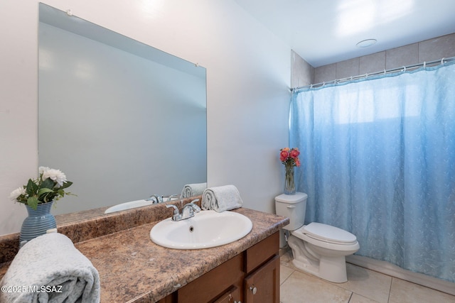 6517 E Cooper St, Tucson, AZ 85710 - bathroom featuring toilet, tile patterned floors, vanity, and a shower with shower curtain