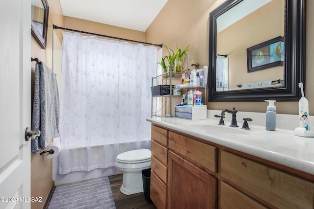 full bathroom with shower / bath combination with curtain, toilet, vanity, and wood finished floors