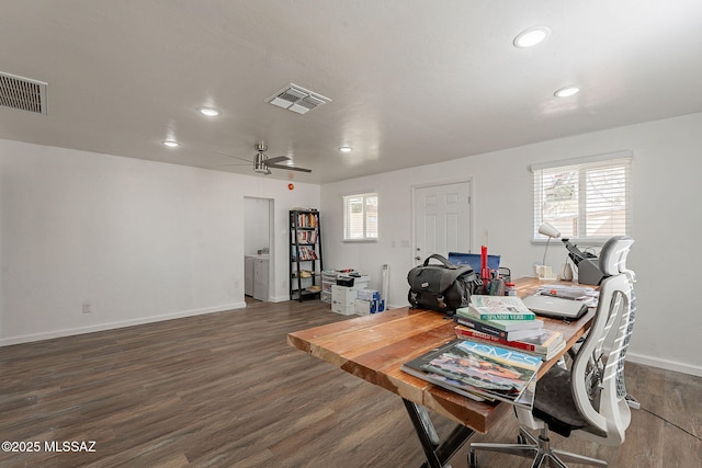 office area with visible vents, plenty of natural light, and wood finished floors