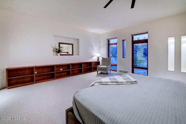 bedroom featuring ceiling fan and carpet floors