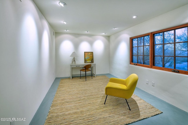 sitting room featuring recessed lighting