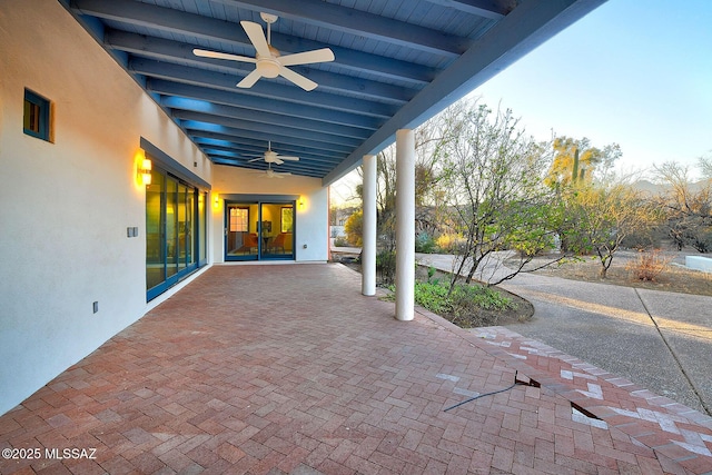 view of patio with ceiling fan
