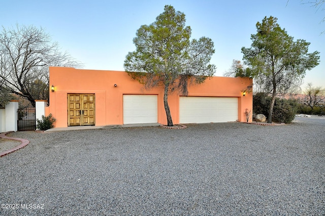 garage with a gate