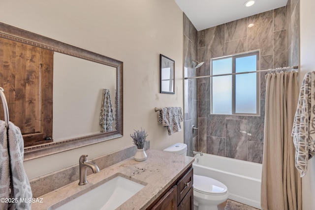bathroom with recessed lighting, shower / tub combo, vanity, and toilet