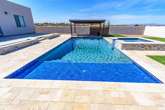 view of swimming pool with a patio area, a fenced backyard, an in ground hot tub, and a fenced in pool
