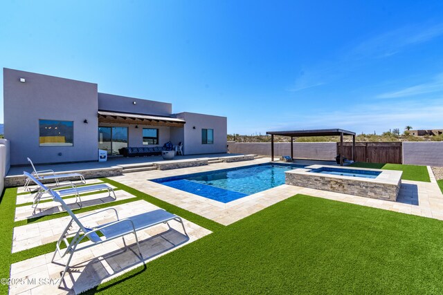 view of pool featuring a fenced backyard, an in ground hot tub, a fenced in pool, and a lawn