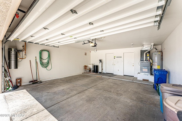 4661 S Desert Grove Ct, Green Valley, AZ 85622 - garage with heating unit, water heater, and a garage door opener
