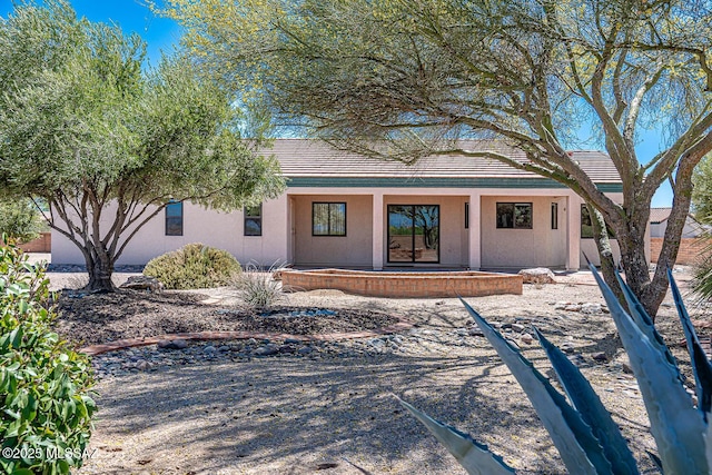 4661 S Desert Grove Ct, Green Valley, AZ 85622 - ranch-style house with covered porch, a tile roof, and stucco siding