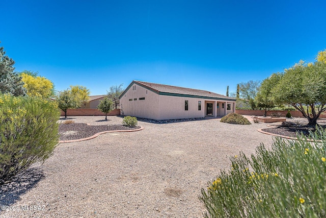 4661 S Desert Grove Ct, Green Valley, AZ 85622 - back of house with stucco siding