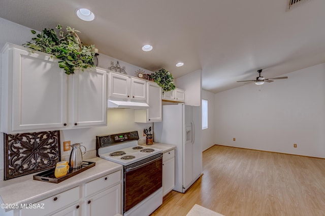 kitchen with light countertops, electric range, white refrigerator with ice dispenser, ceiling fan, and white cabinets