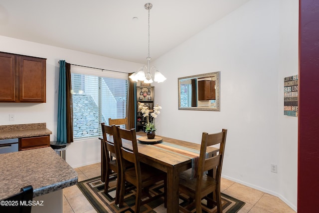 61080 Halter Pl, Saddlebrooke, AZ 85739 - dining space featuring light tile patterned floors, a notable chandelier, baseboards, and vaulted ceiling