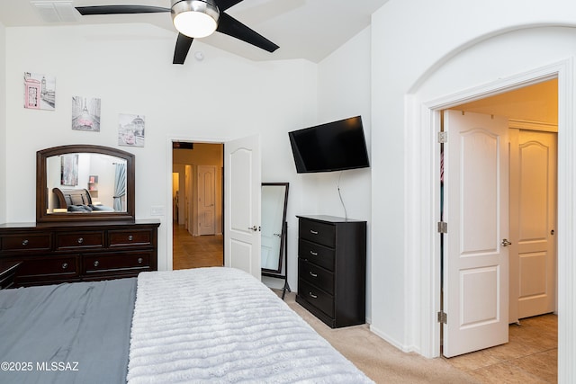 61080 Halter Pl, Saddlebrooke, AZ 85739 - bedroom featuring a ceiling fan, light tile patterned floors, light carpet, and visible vents
