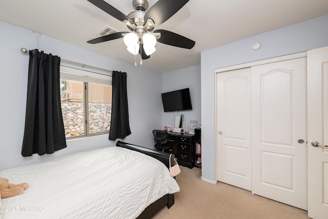 61080 Halter Pl, Saddlebrooke, AZ 85739 - bedroom featuring a ceiling fan, a closet, light colored carpet, and visible vents