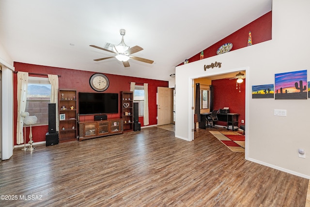 61080 Halter Pl, Saddlebrooke, AZ 85739 - living area with baseboards, wood finished floors, vaulted ceiling, and a ceiling fan