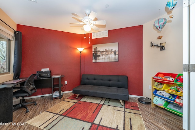 61080 Halter Pl, Saddlebrooke, AZ 85739 - office area featuring baseboards, visible vents, wood finished floors, and a ceiling fan