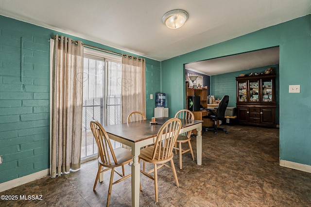 dining room with baseboards