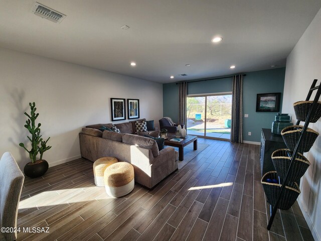 14023 E Canidae Dr E, Vail, AZ 85641 - living room with baseboards, wood tiled floor, visible vents, and recessed lighting