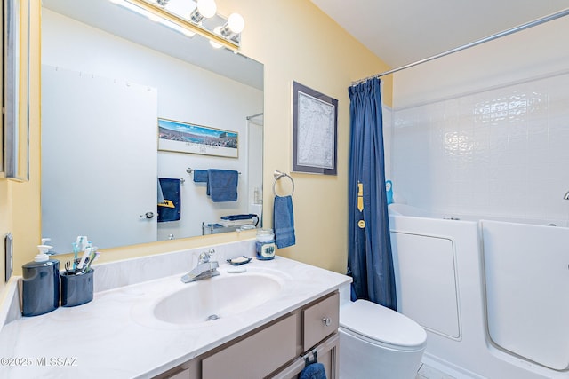 full bath with toilet and vanity