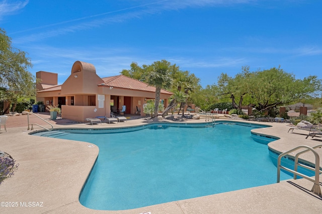 community pool with a patio