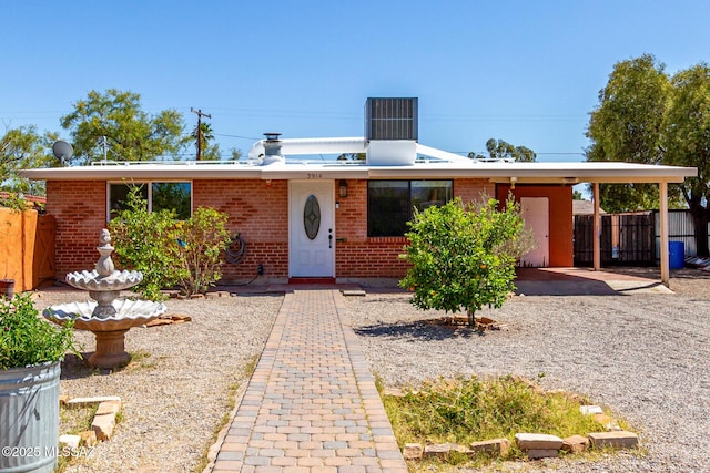 5914 E Beverly St, Tucson, AZ 85711 - single story home with brick siding and fence