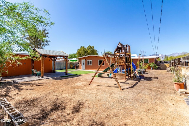 5914 E Beverly St, Tucson, AZ 85711 - view of play area with a fenced backyard